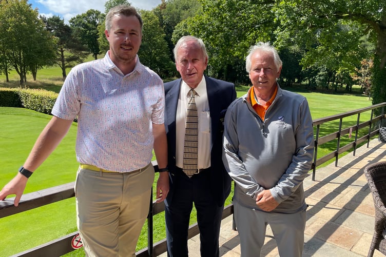 Ross Golf Club president Graeme Forrester with father and son winners Paul and Allan Burry. Photo: Ross Golf Club