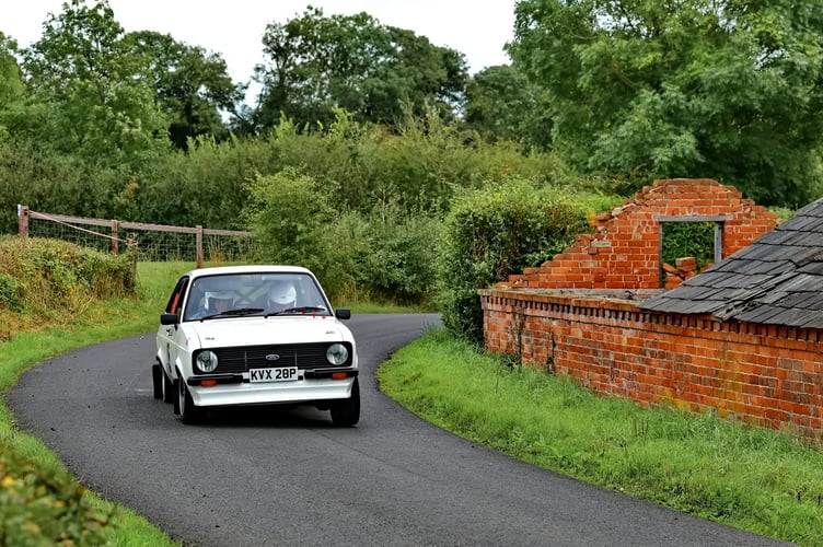 Justin Brooks and Dan Evans round the corner in the Vauxhall Nova