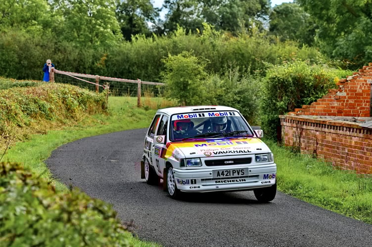 Rich Thomas and Paul Cook in the 115 Escort in the Hills Ford Stages