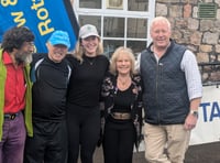 Rotarian charity walk cash to be handed over
