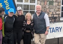 Rotarian charity walk cash to be handed over