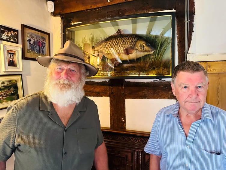 Renowned angler Des Taylor (left) and Docklow owner Mike Bozward with Clarissa at the Fisherman's Arms