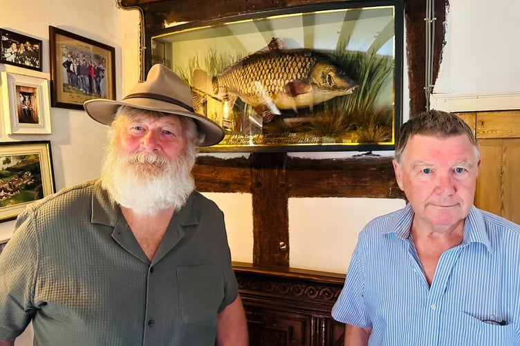 Renowned angler Des Taylor (left) and Docklow owner Mike Bozward with Clarissa at the Fisherman's Arms