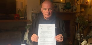 Lorry driver who alerted authorities to stowaways battling £12k fine