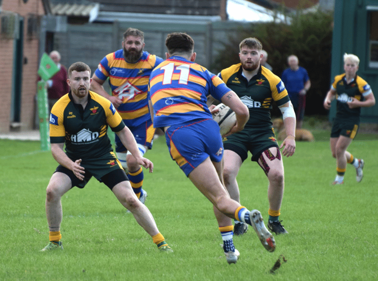 Newent defenders get ready to stop an opponent