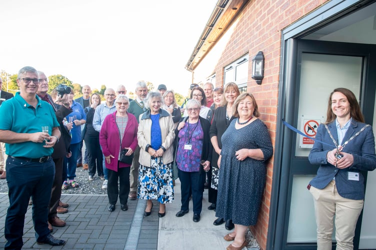 Mayor of Newent Cllr Sara Hulbert cuts a ribbon to officially open the pavilion.