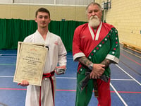 Trio kick on with black belt tae kwon-do gradings
