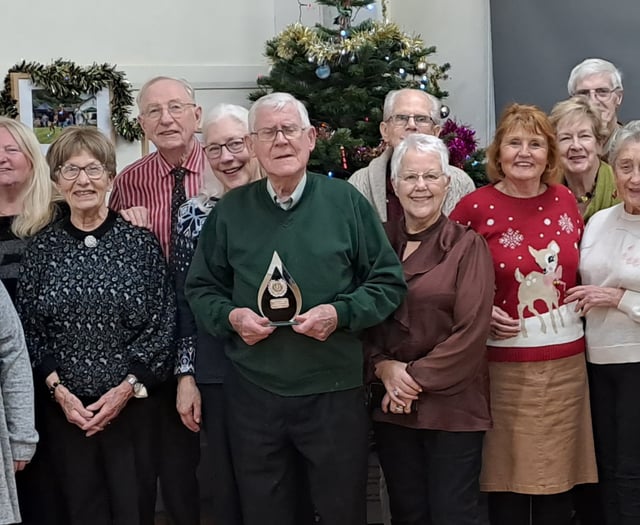 Matty is presented with Good Neighbour’s award 