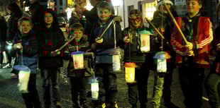 It's all glow as torchlight parade lights up town