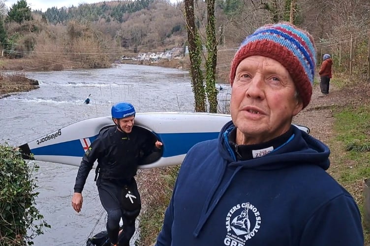 Veteran competitive slalom canoeist Mike Mitchell said they were hit by an oil spill 27 miles upstream