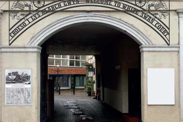 The entrance to White Swan Court could have an illustrated archway and an information board 