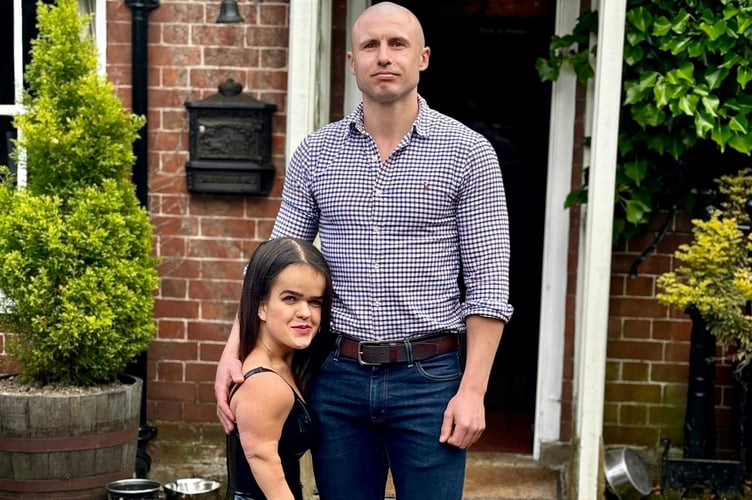 Caitlin Hellyer with boyfriend Guy Pritchard. A 3ft 8in woman with dwarfism gets mistaken for her 5ft 8in boyfriend's little sister but says "I don't care what others say". Caitlin Hellyer, 23, has achondroplasia dwarfism - a bone growth disorder caused by a genetic mutation in the arms and legs. She says heads turn when she goes out with 5ft 8in boyfriend Guy Pritchard, 33. Caitlin, from Forest of Dean, Gloucestershire, says the couple get stared at and laughed at - and people even question if their love is genuine. But Caitlin said their two-and-a-half year relationship is just like any other - and they even make jokes about their own differences.