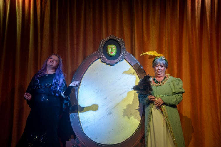 Narcissa (Louise Bullen) an Lady Hyacinth (Shirley James with the magic mirror.