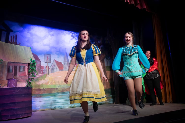 Lily Gardiner (Snow White) and Laura Hyde (Prince Rupert) perform a tap dance.