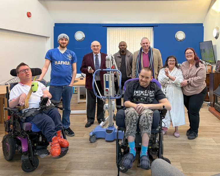 Michael Holland (Head of Freemasonry in Herefordshire), third from right, and Tim Bridgland-Taylor (Herefordshire Freemasons’ Charity Steward), third from left. They are shown with Steve, Matthew and Helen, and staff members, Georgia (Registered Manager), John and Dylan (Enabling Support Workers)