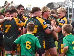 Unbeaten Green Army march to title at rocking Rec