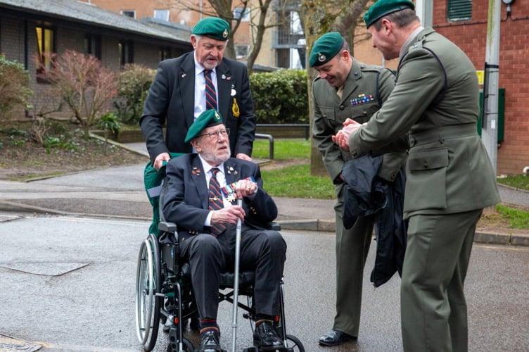 One-hundred-year-old veteran John Eskdale inspires the next generation of Royal Marines during a visit to the Commando Training Centre in Lympstone, Devon. Release date February 21 2025. A 100-year-old World War Two commando inspired the next generation of Royal Marines during a visit to the Commando Training Centre in Lympstone, Devon. John Eskdale from Lydney in Gloucestershire saw combat with HMS Charybdis in the Mediterranean on the Malta Convoys in 1942 and was involved in the invasion of Sicily in the summer of 1943. He survived the sinking of Charybdis by German Torpedo boats near the Channel Islands in late 1943 and went onto see action in Normandy and in the Far East.