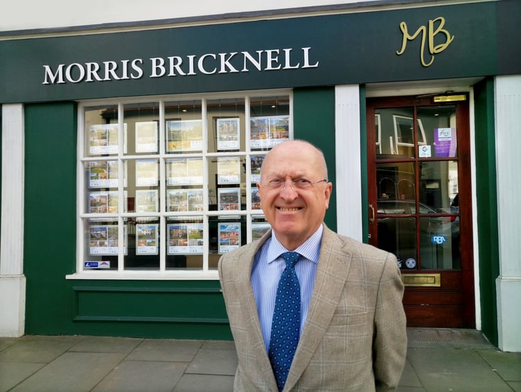 Norman Bricknell outside his estate agent office in Ross.