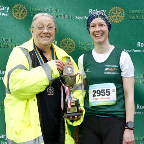 Sherry Phillips President of the Rotary Club of the Royal Forest of Dean presents Faye Johnson with the cup for first female Forester,