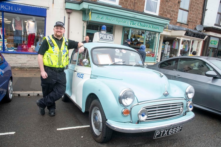 Special sergeant Sean Peace with a 1968 Moris Minor police car tha that originally patrolled in the South Wales Valleys.