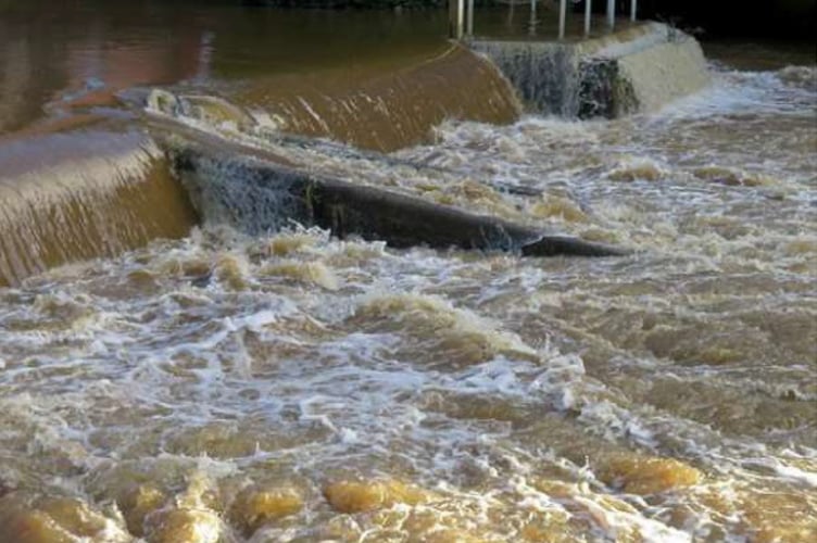 The weir was in full spate at the time