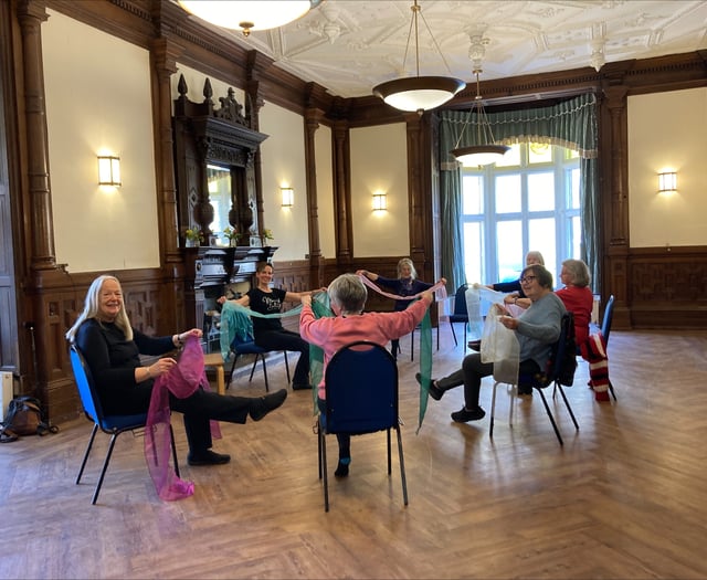 Seated Silver Swans Ballet in Monmouth