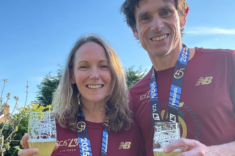 Rebecca and Rich Foster celebrate with a well-earned beer 