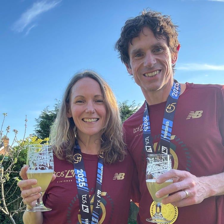 Rebecca and Rich Foster celebrate with a well-earned beer