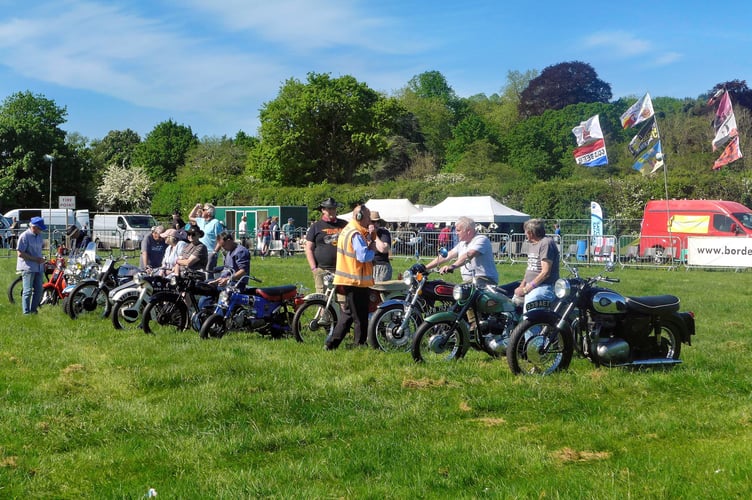 Parade of motorcycles in the main ring