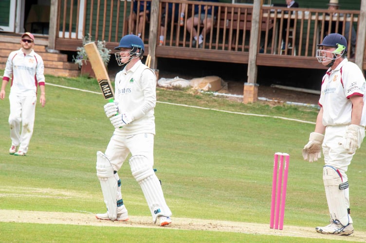 Gus Carini-Roberts watches as a shot clears the boundry.