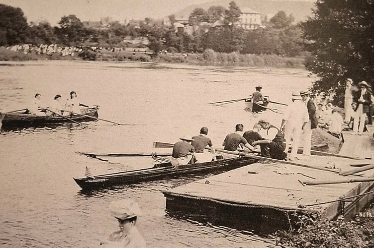 Boats launch out at Ross in an early regatta