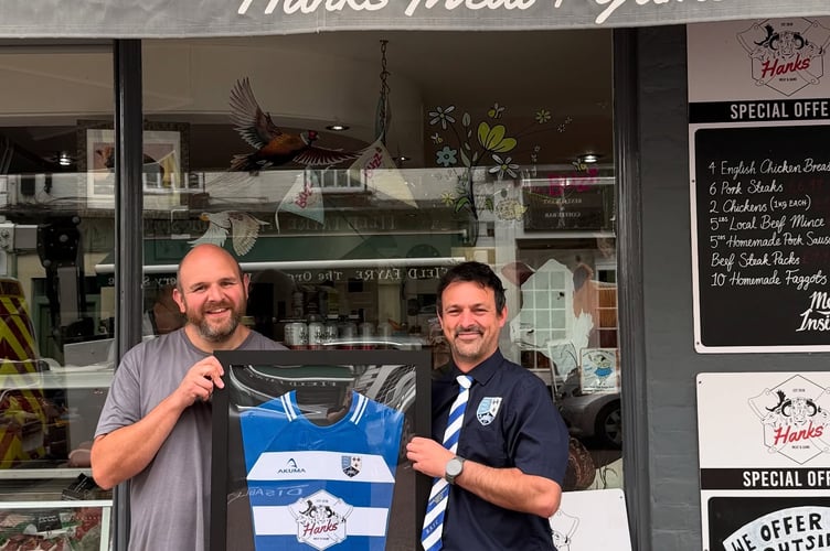 Local butcher and Ross RFC juniors sponsor Tim Hanks is presented with his own framed  match jersey