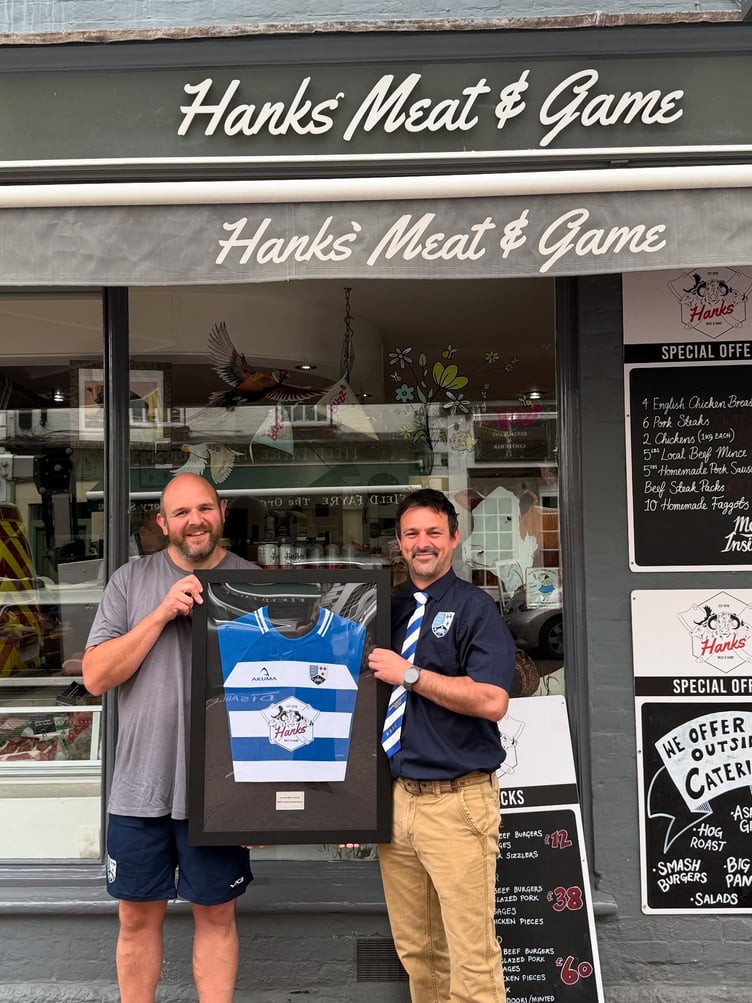 Local butcher and Ross RFC juniors sponsor Tim Hanks is presented with his own framed match jersey