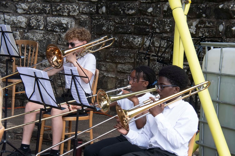 Cinderford trombonists playing a Disney medley.