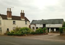 Dilapidated barn set to become three new homes