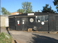 Fire-wrecked old saw works site for sale