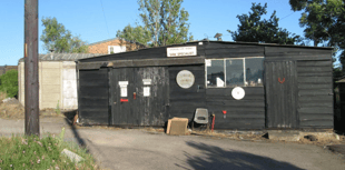 Fire-wrecked old saw works site for sale