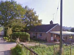 Bungalow owner seeks removal of farming occupancy condition