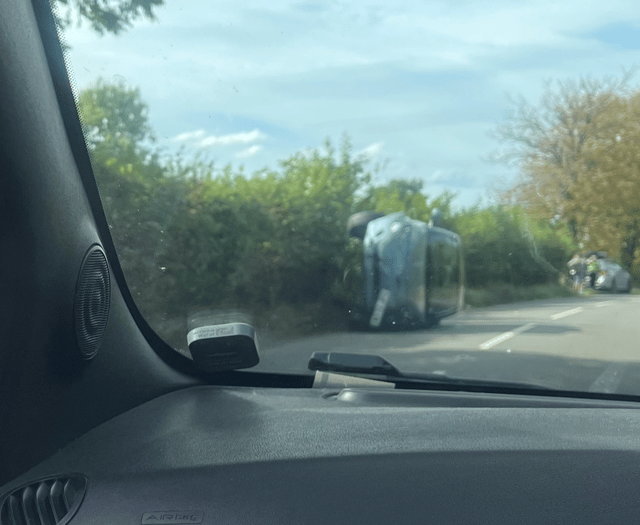 Car on its side near St Briavels