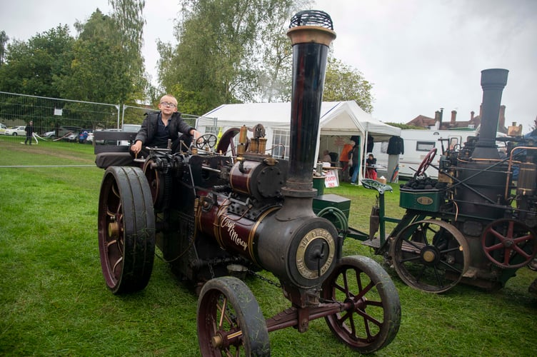 Jenson Kidley on Cerys Mercy, a half size model of a Burrell agricultural tractor.
