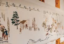 Arts Society volunteers reveal 10-metre Hellens Manor embroidery