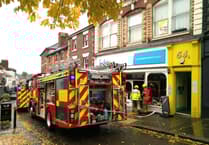 Firefighters quickly control charity shop's electrical fault