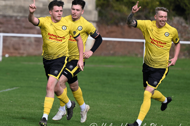 Newent players celebrate going in front - but the joy wasn't to last