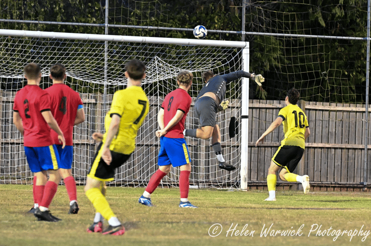 Newent go close as the Saracens keeper makes a flying save