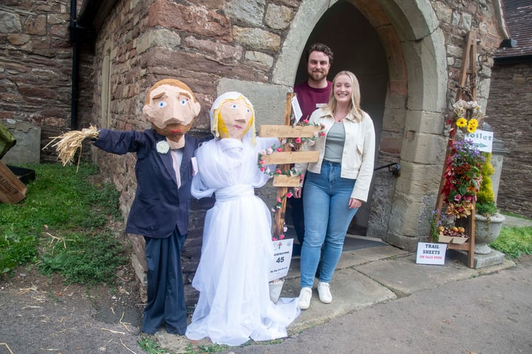 A scarecrow couple was based on Philippa and Jordan Hooper who married at Longhope Church in June.