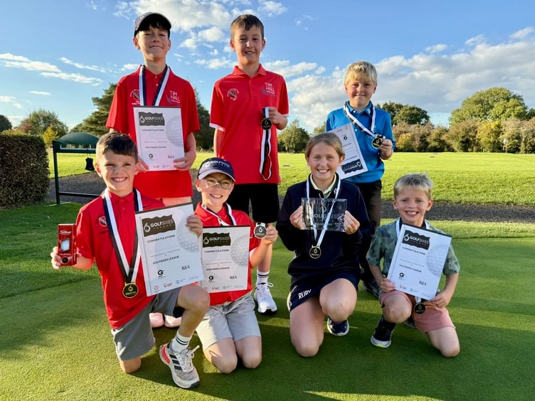Ross Golf Club's Sixes League juniors proudly show their trophies