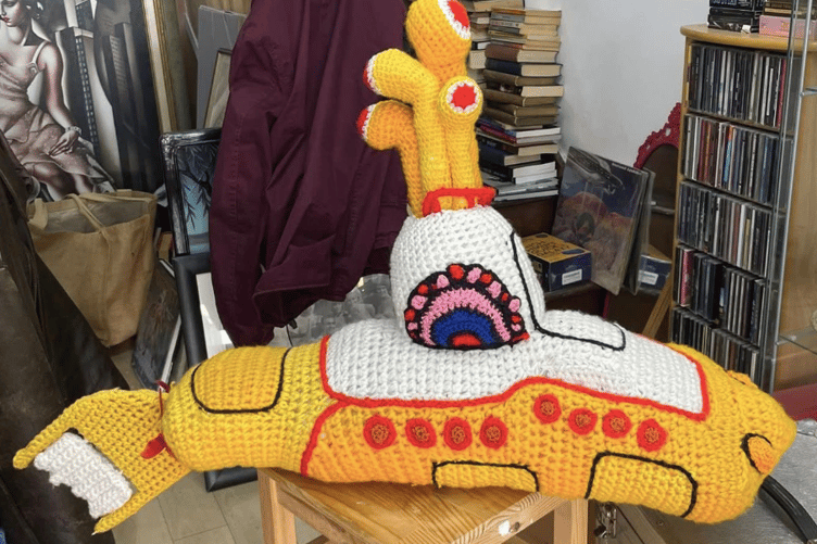 Councillor Richard McEvoy plans for the knitted Yellow Submarine to be displayed in shops across Ross-on-Wye.
