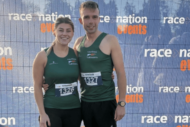 Ben and Emma Humphries celebrate their personal bests at the Stroud Half Marathon.