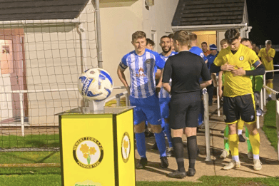 Players from Newent Town and Frampton United line up ahead of their County Cup clash at Wildsmith Meadow.