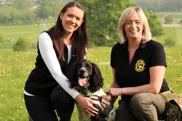 Dr Lucy Bearman-Brown (left) with Henry and his handler Louise Wilson.